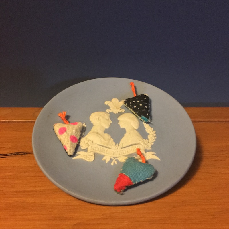 photo of a ceramic plate with Charles & Diana in relief in white